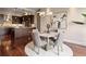 Dining area with hardwood floors and easy access to the kitchen at 7600 Landmark Way # 1215, Greenwood Village, CO 80111