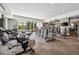 Large community gym featuring modern exercise equipment, a television, and carpeted floors at 7600 Landmark Way # 1215, Greenwood Village, CO 80111