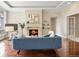 Living room featuring a cozy fireplace and modern furniture at 7600 Landmark Way # 1215, Greenwood Village, CO 80111