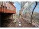 Exterior view of backyard with a deck and flagstone walking path at 2304 S Holly St # A, Denver, CO 80222