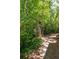 Backyard featuring a serene, landscaped trail at 2304 S Holly St # A, Denver, CO 80222