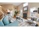Spacious living room featuring a fireplace and comfortable furnishings at 2304 S Holly St # A, Denver, CO 80222