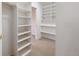 Walk-in closet with shelving units at 2304 S Holly St # A, Denver, CO 80222