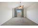 Bright bedroom featuring a ceiling fan, neutral carpet and a picturesque window view at 7662 Bristolwood Dr, Castle Pines, CO 80108