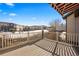 Enjoy the deck with a partial awning, views of the community, and ample space for outdoor living at 7662 Bristolwood Dr, Castle Pines, CO 80108