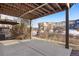 Covered patio with a concrete floor that's perfect for relaxing or entertaining friends and Gathering at 7662 Bristolwood Dr, Castle Pines, CO 80108