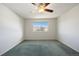 Bright room featuring neutral walls, green carpeted flooring and natural light from the window at 7662 Bristolwood Dr, Castle Pines, CO 80108