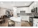 Open-concept design integrates the kitchen, dining, and living areas, perfect for entertaining at 10066 Belvedere Cir, Lone Tree, CO 80124