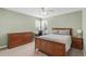 Bedroom featuring a wooden bed frame, matching dressers, desk, and two windows with blinds at 445 Brendon Ct, Castle Pines, CO 80108