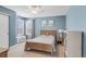 Cozy bedroom featuring a bed, a window with blinds, and a toy chest at 445 Brendon Ct, Castle Pines, CO 80108