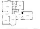 A first floor blueprint with a large living room, kitchen, dining area, breakfast nook, and foyer at 445 Brendon Ct, Castle Pines, CO 80108