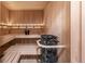Wood sauna featuring benches and an electric heater at 445 Brendon Ct, Castle Pines, CO 80108