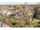 Aerial view of home with a large backyard featuring a patio and mature landscaping at 537 S Grape St, Denver, CO 80246
