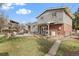 Grassy backyard with patio and outdoor seating at 537 S Grape St, Denver, CO 80246