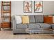Cozy living room featuring a comfortable sofa, stylish decor, and plenty of natural light at 537 S Grape St, Denver, CO 80246