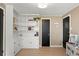 Bright living room with white built-in shelves, neutral colors, and great natural light at 537 S Grape St, Denver, CO 80246