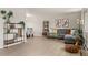 Spacious living room with hardwood floors, stylish decor, and an open layout at 537 S Grape St, Denver, CO 80246
