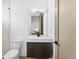 The bathroom features a modern vanity and vessel sink at 4752 Eliot St, Denver, CO 80211