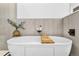 Contemporary bathroom with a modern soaking tub and decorative wood bath tray at 4752 Eliot St, Denver, CO 80211