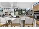 Contemporary kitchen featuring an island, gas range, and stainless steel appliances at 4752 Eliot St, Denver, CO 80211