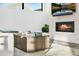 Cozy living room featuring a fireplace, large coffee table, and comfortable sofa at 4752 Eliot St, Denver, CO 80211
