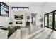 Spacious living room with fireplace, television, and modern design at 4752 Eliot St, Denver, CO 80211