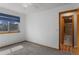 Clean bedroom with a large window and ensuite bathroom at 17018 Carr Ave, Parker, CO 80134