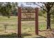 Sign for Clarke Farms Cherokee Park, open dawn to dusk for residents only; no trespassing allowed at 17018 Carr Ave, Parker, CO 80134