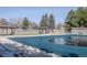 Outdoor community pool with covered gazebos, perfect for relaxing on hot summer days at 17018 Carr Ave, Parker, CO 80134
