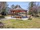Outdoor gazebo with picnic table and benches, perfect for neighborhood gatherings at 17018 Carr Ave, Parker, CO 80134