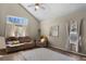 Bright living room featuring a vaulted ceiling and large windows at 17018 Carr Ave, Parker, CO 80134