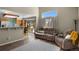 Spacious living room with sliding door access to the backyard at 17018 Carr Ave, Parker, CO 80134