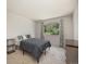 Comfortable bedroom with natural light and neutral decor, providing a relaxing atmosphere at 309 E Highline Cir # 104, Centennial, CO 80122