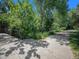 Picturesque community walking path surrounded by lush greenery, perfect for a stroll at 309 E Highline Cir # 104, Centennial, CO 80122
