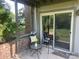Charming outdoor patio, perfect for enjoying morning coffee or evening sunsets at 309 E Highline Cir # 104, Centennial, CO 80122