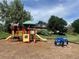 Colorful playground and jeep offer fun activities and a great place for to play at 309 E Highline Cir # 104, Centennial, CO 80122