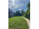 Scenic path lined with lush greenery at 309 E Highline Cir # 104, Centennial, CO 80122