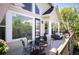 Outdoor deck featuring dining and lounge seating areas perfect for relaxing at 7007 S Garrison St, Littleton, CO 80128