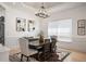 Beautiful dining area with elegant decor and large windows at 7007 S Garrison St, Littleton, CO 80128