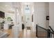 Bright foyer with soaring ceilings, hardwood floors and open floor plan at 7007 S Garrison St, Littleton, CO 80128