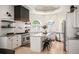 Gourmet kitchen featuring stainless steel appliances and sleek center island at 7007 S Garrison St, Littleton, CO 80128