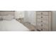 Bedroom with a bed, side table with a lamp, and a dresser at 3365 N Coolidge Way, Aurora, CO 80019