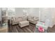 Relaxing living room with stylish furniture, neutral colors, and plenty of natural light at 3365 N Coolidge Way, Aurora, CO 80019