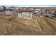 Aerial view of home, neighborhood, and expansive yard showcasing the property's location and features at 42855 Hawktree Cir, Elizabeth, CO 80107