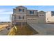 Beautiful two-story home with a two car garage and well-manicured lawn at 42855 Hawktree Cir, Elizabeth, CO 80107