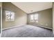 Spacious bedroom with carpet and two windows allowing natural light at 7415 S Alkire St # 302, Littleton, CO 80127