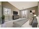 Bright bedroom with neutral tones, carpet, large windows, and modern furniture at 7415 S Alkire St # 302, Littleton, CO 80127