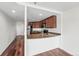 This kitchen offers granite counter seating and stainless steel appliances at 100 Park Ave # 907, Denver, CO 80205