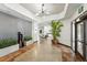 Elegant lobby area with stylish decor, plants, and inviting atmosphere at 100 Park Ave # 907, Denver, CO 80205