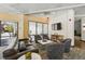 Comfortable lounge with sofa, chairs, tv, and boardgames for relaxing and entertaining at 100 Park Ave # 907, Denver, CO 80205
